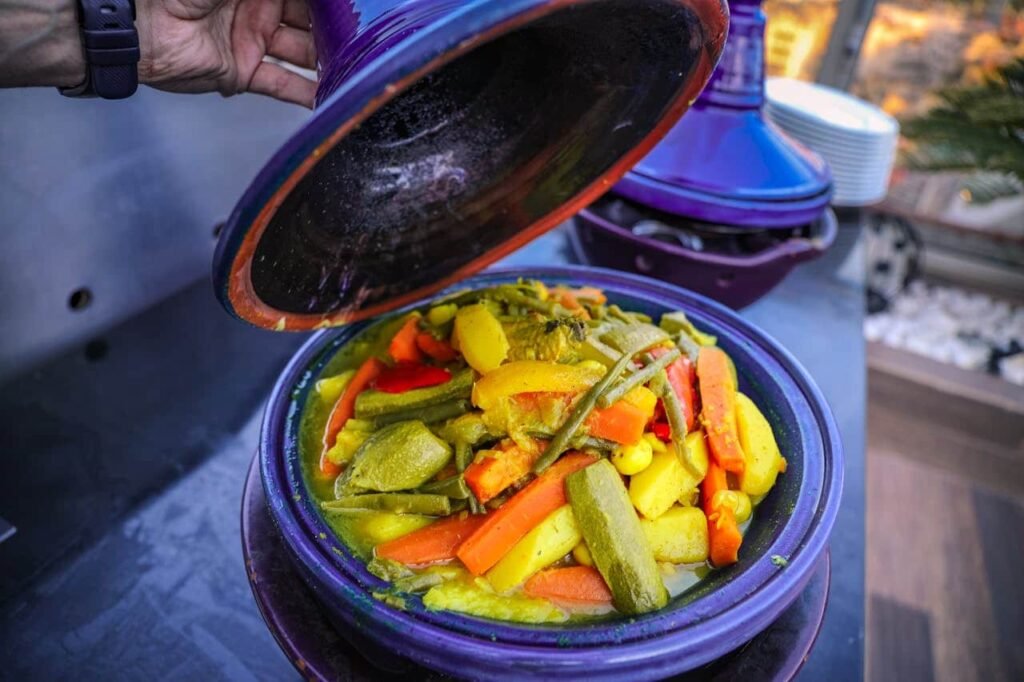 Traditional Moroccan dishes served in Fes Medina riad courtyard